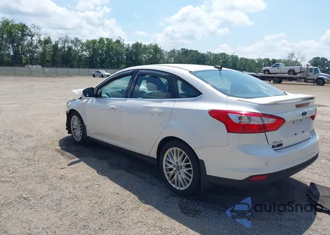 2013 Ford Focus Titanium из США, поврежденный, VIN 1FADP3J23DL105575